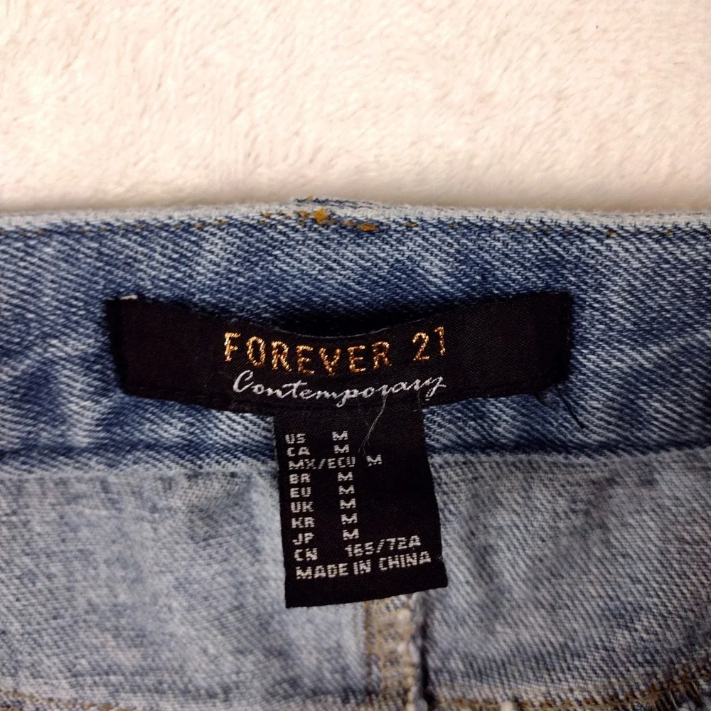 Forever 21 Contemporary Blue Distressed Denim Mini Skirt Raw Hem Womens Medium‎